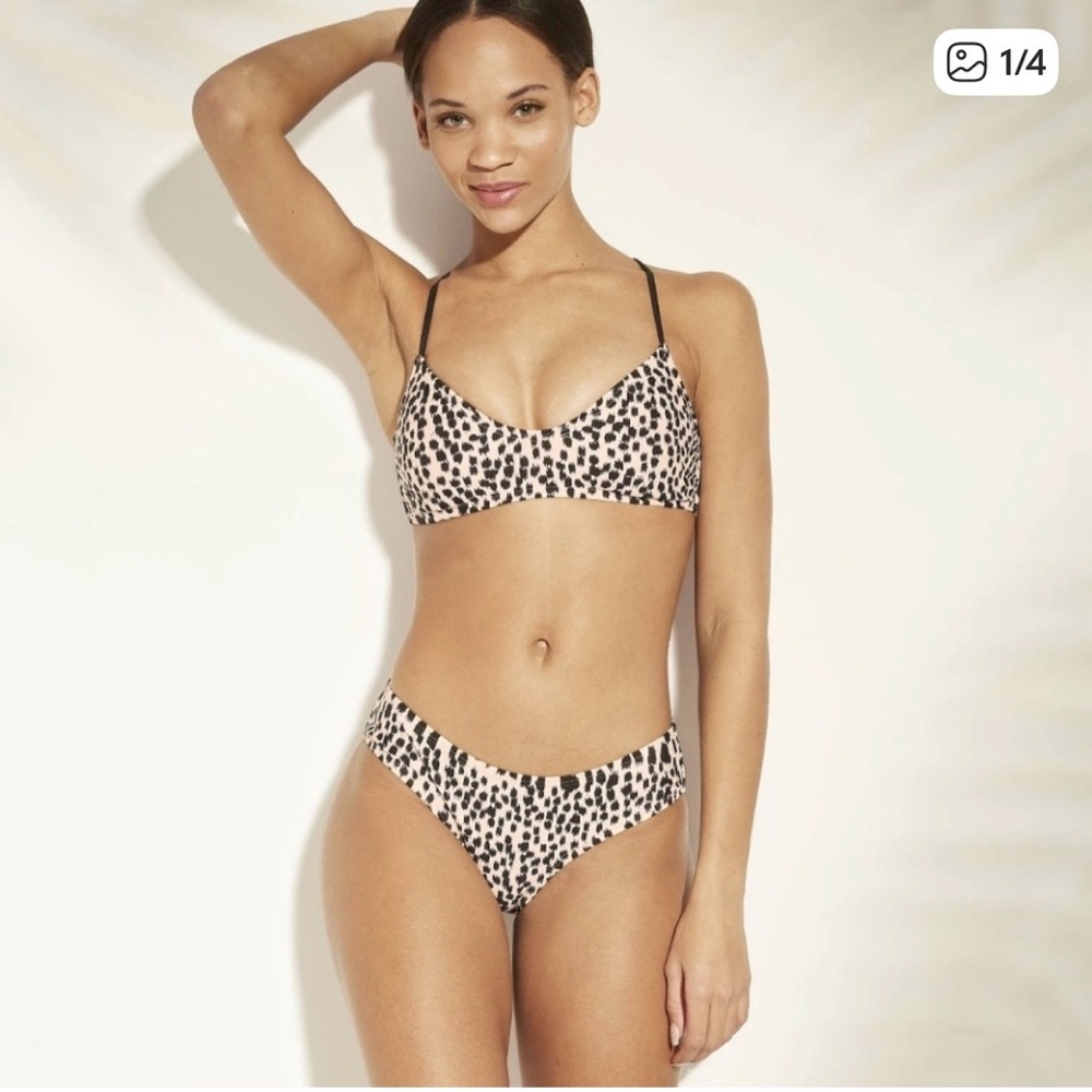 Xhilaration leopard print pink bikini. Top XL and bottom is a large.